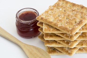 Fototapeta na wymiar cracker with bottle of jam