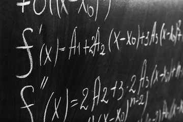 Fototapeta na wymiar School blackboard with formulas
