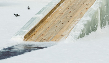 wooden and ice slope