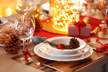 Christmas table setting with holiday decorations