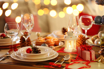 Christmas table setting with holiday decorations