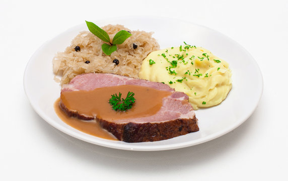 Kasselerbraten mit Kartoffelp&uuml;ree und Sauerkraut