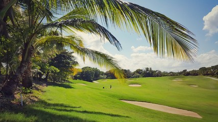 Besutiful view toward the golf course in a luxury tropical resort - obrazy, fototapety, plakaty
