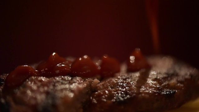 hamburger on the plate with ketchup