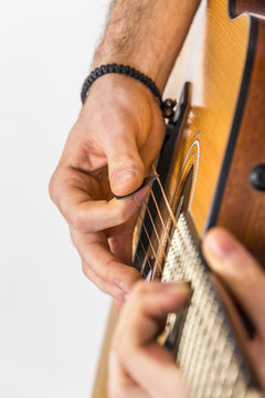 detail of fingers and hand of guitar player