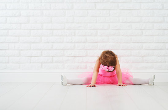 little girl dancer ballet ballerina stretching