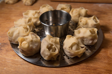 Raw Manti with meat inside (dumpling)