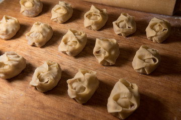 Raw Manti with meat inside (dumpling)