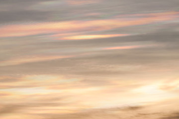 Dramatic scattering sunlight on twilight cloudscape