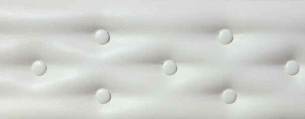 White Leather Background with Buttons
