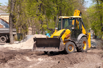 excavator works with the earth closeup