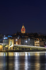 Night view of Galata bridge and Galata Tower.