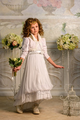 Little girl in dress with flowers