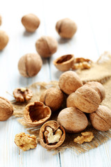 Walnuts on a blue wooden table