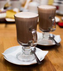 Irish coffee on wooden table