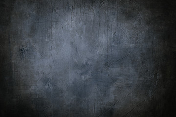 grunge blue background or texture with dark vignette borders