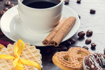 Biscuits and coffee on table