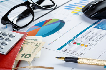 Financial charts and graphs on the table