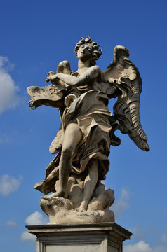 Angel shows Jesus INRI sign