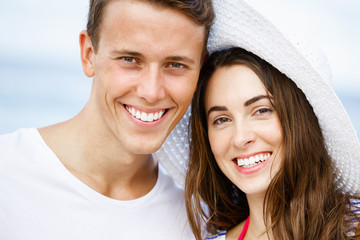 Romantic young couple on the beach