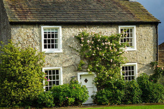 Beautiful English house with climbing roses
