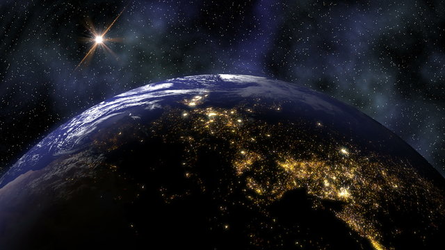 Earth 1015: Planet Earth rotates in space from day into night and city lights turn on (Loop).