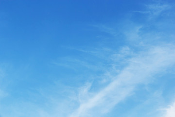 Fantastic soft white clouds against blue sky background, soft fo
