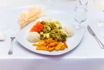 Table setting for an wedding reception. White background.