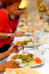 Table setting for an wedding reception. White background.