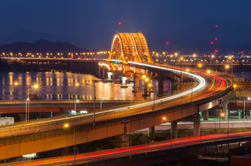 Fototapeta premium Han river with Seongsan bridge at night in Seoul, Korea (long exposure)
