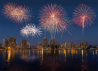 Colorful firework over Honolulu skyline Hawaii