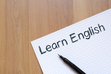 Learn english write on notebook