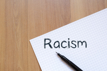 Racism write on notebook