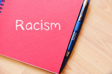 Racism write on notebook