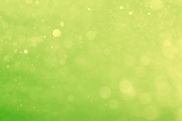 Fototapeta na wymiar abstract circular green bokeh background