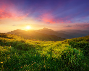 Mountain valley during sunrise. Natural summer landscape - obrazy, fototapety, plakaty