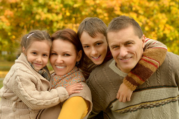 Fototapeta premium Happy family in autumn forest
