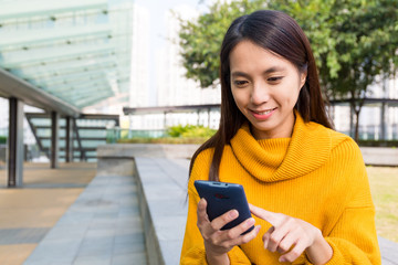 Young Woman use of the mobile phone