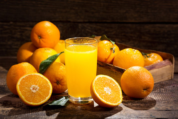 glass of orange juice with fresh fruits