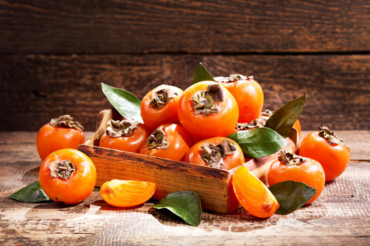 fresh persimmons in a box