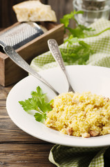 Italian traditional risotto with saffron and ham