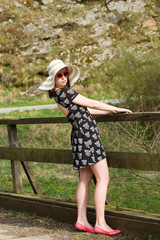 cheerful fashionable woman with hat
