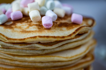 Pancake with caramel, marshmallow and honey