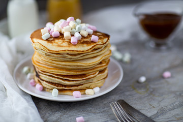 Pancake with caramel, marshmallow and honey