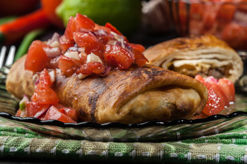 Mexican chimichanga with salasa dip