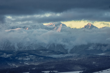 Naklejka na ściany i meble Morning panorama of snowyTatra Mountains over Spisz Highland, Poland