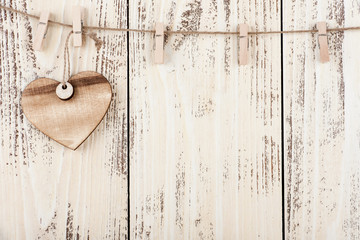 Valentine's Day or Mother's day background with wooden heart