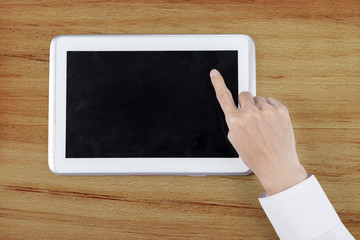 Businessman with Finger Touching Digital Tablet