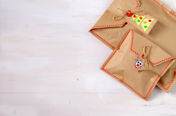 Different Christmas presents with handmade decoration