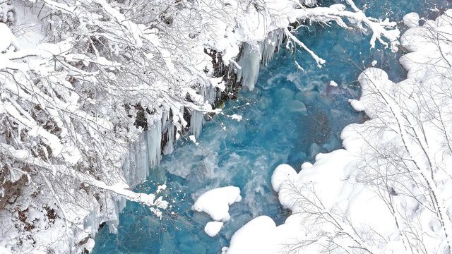 4K footage - The Biei blue river in winter, Biei, Hokkaido, Japan.